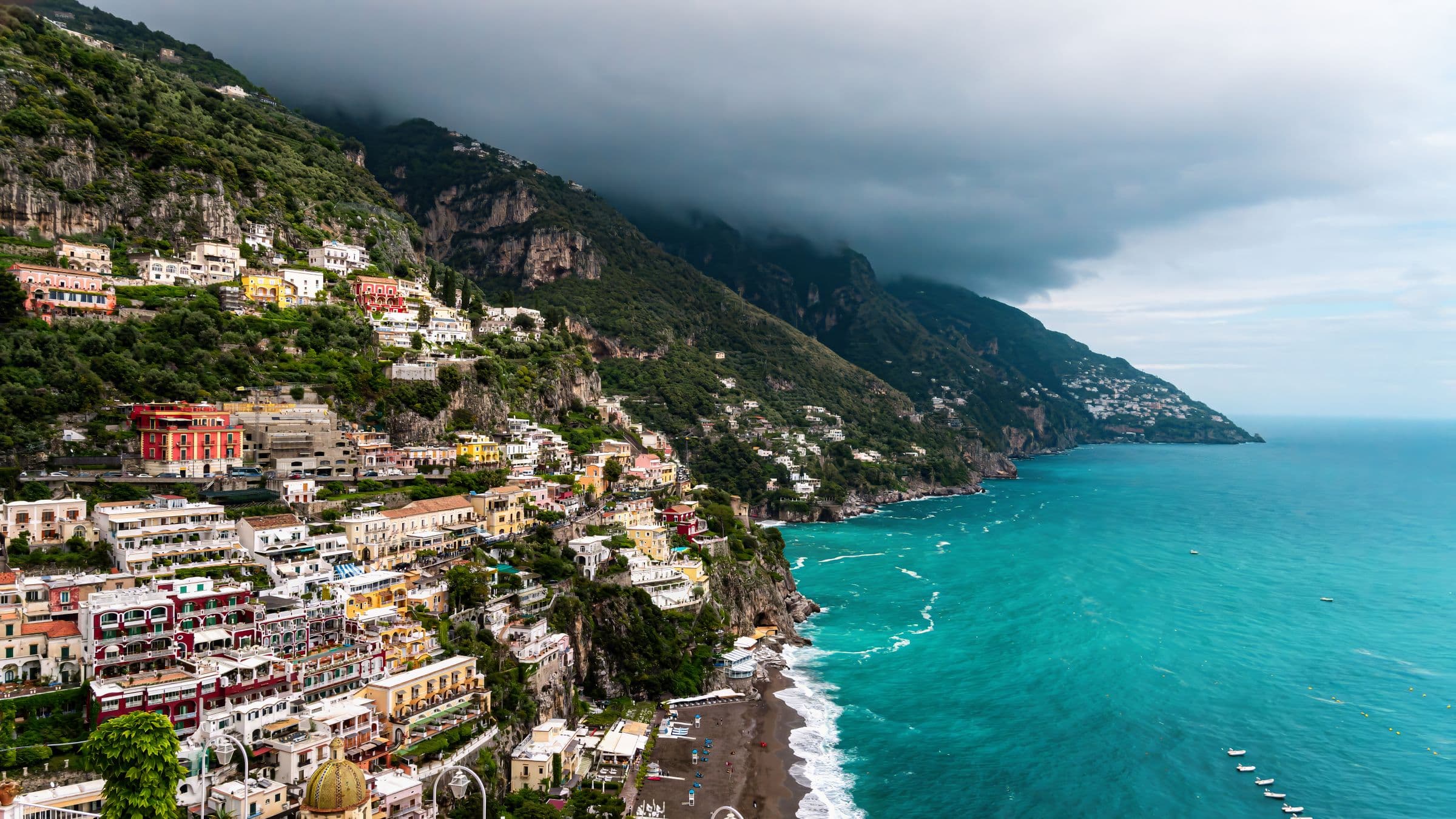Positano's cliffside village above a teal Mediterranean bay